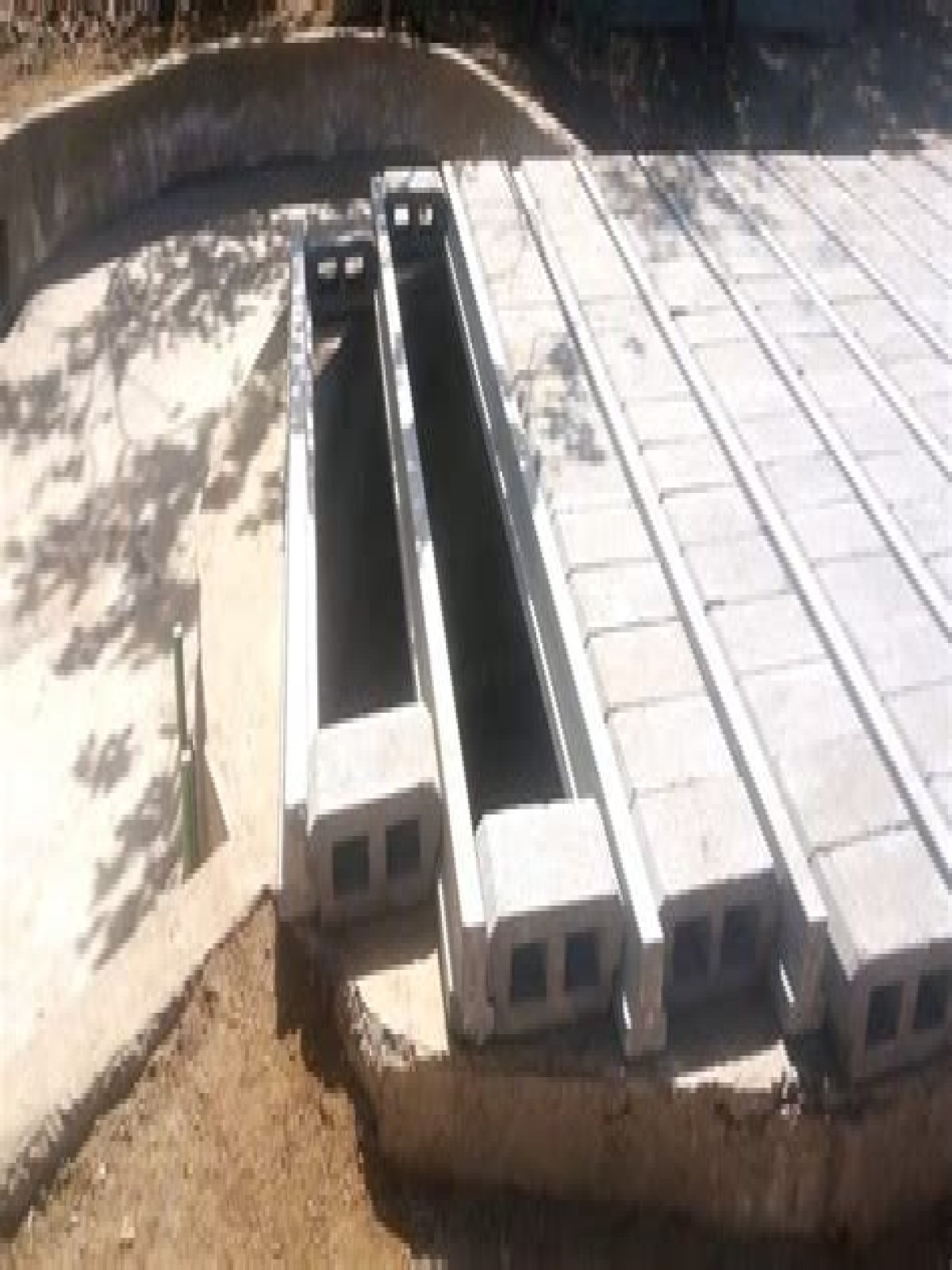 Can I pour a concrete slab over my septic tank?