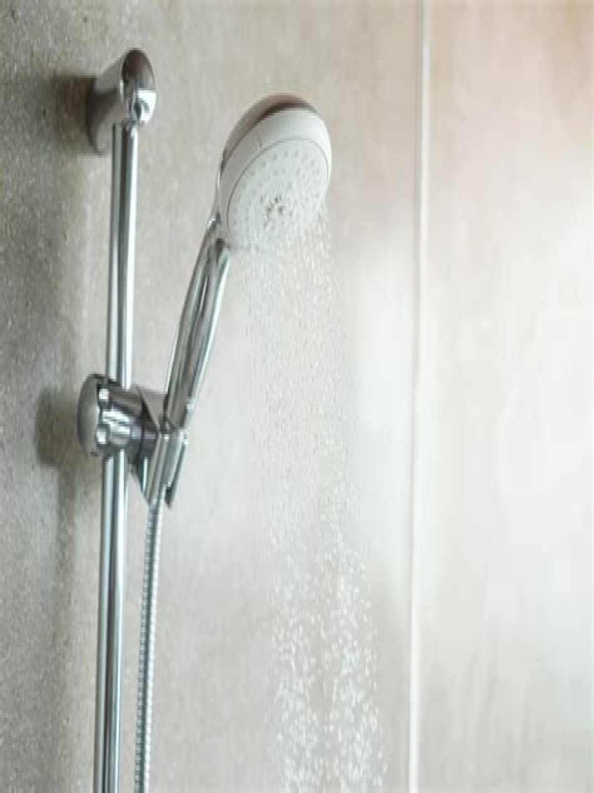 How tall do you have to be to stand under a shower head?