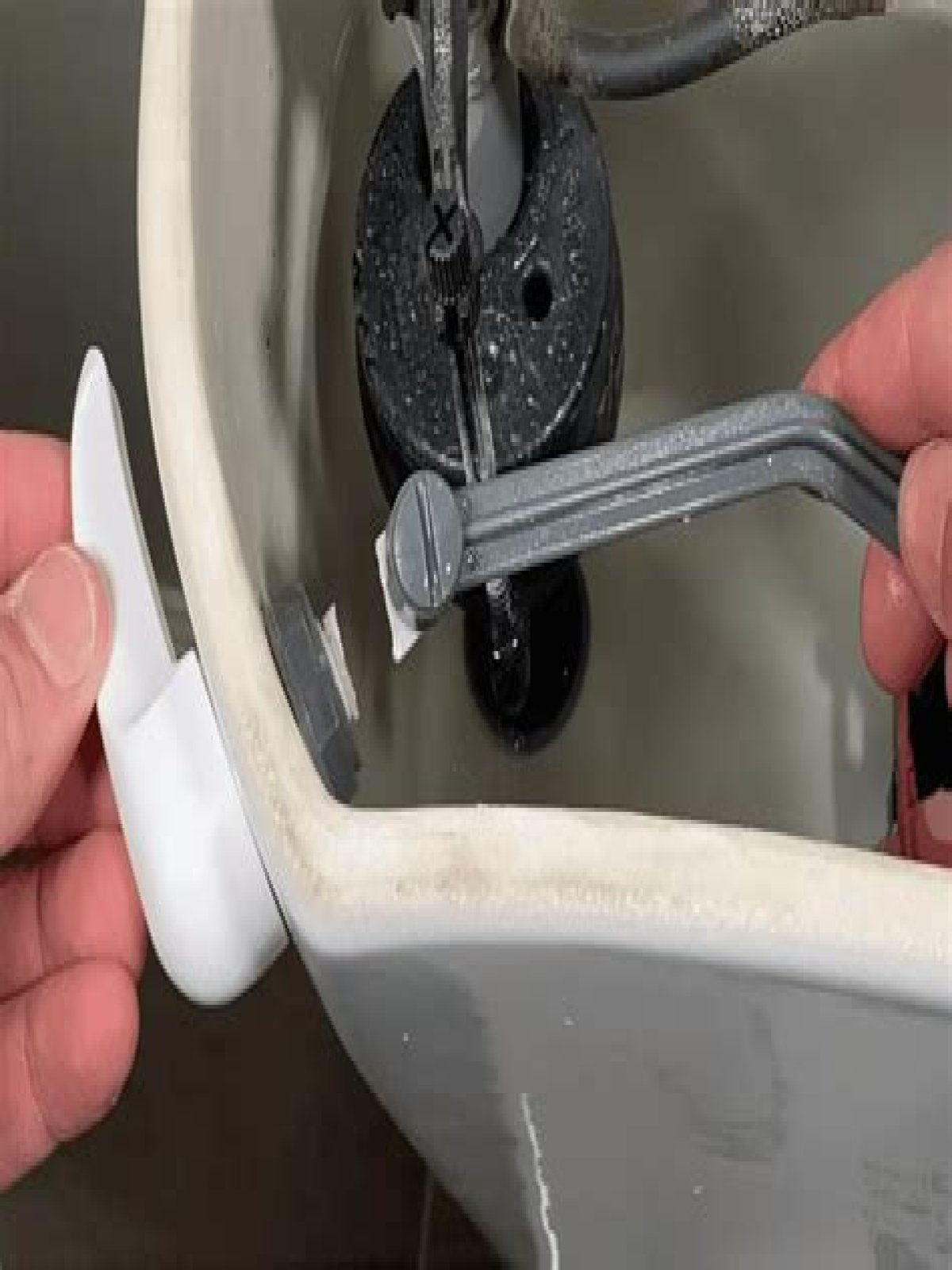 How to flush a toilet when the handle is broken?